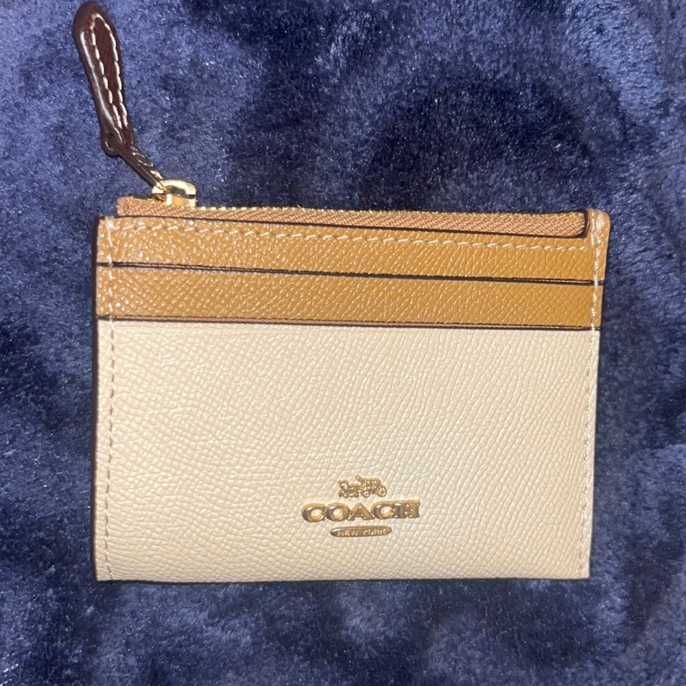 Nude & Brown coach hand wallet